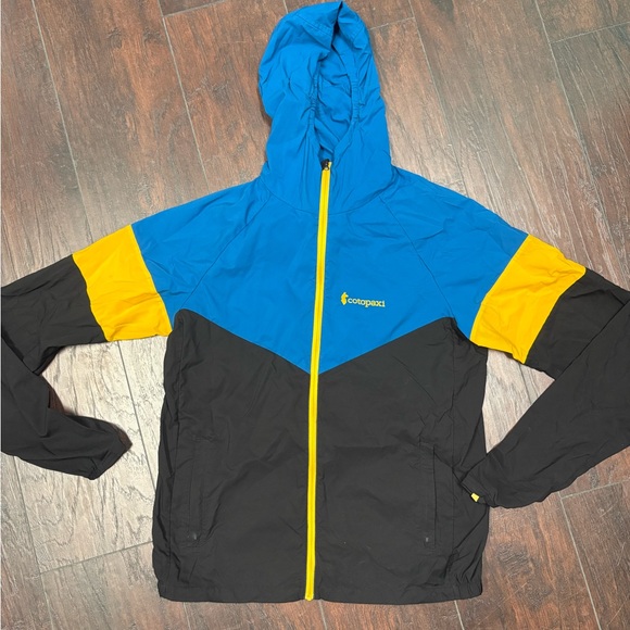 Cotopaxi Vibrant Blue and Black Jacket with Yellow Highlights - Picture 1 of 8